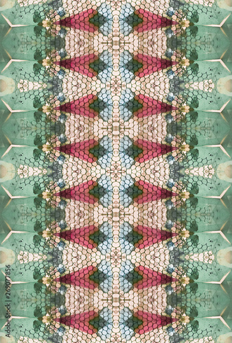 Textured pattern made with crystals and wire inside kaleidoscope