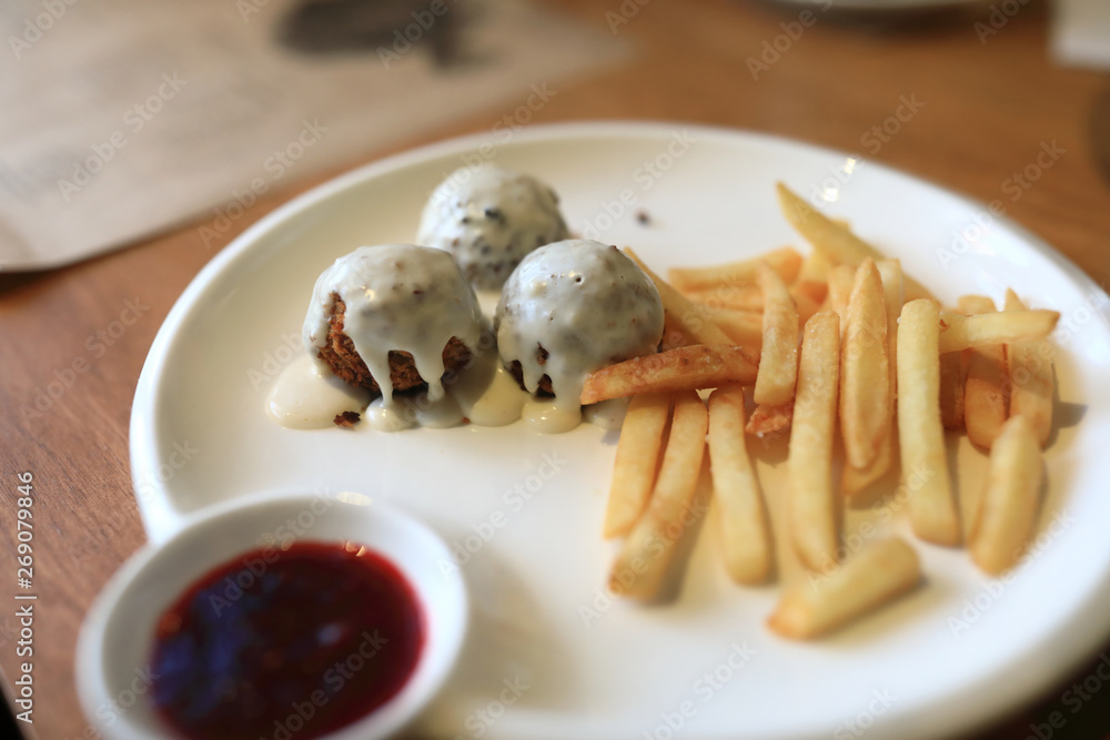 Fish Balls with french fries and sauce Fish Balls with french fries and sauce
