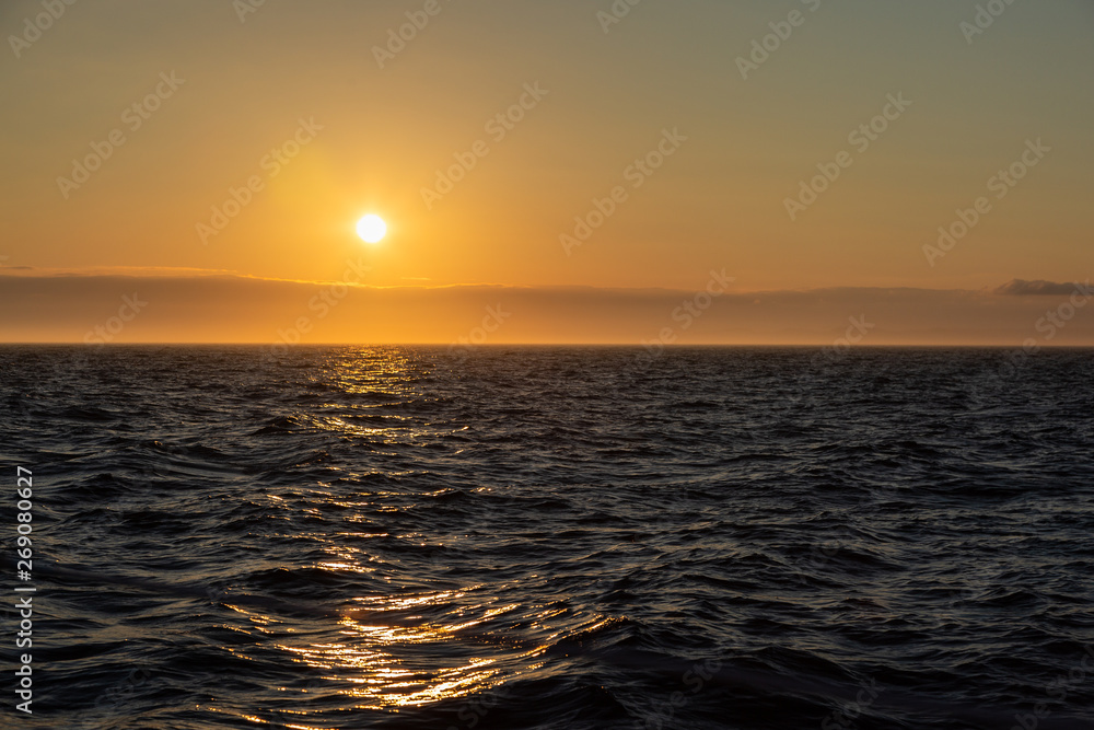 Amazing clear warm and calm ocean sunset