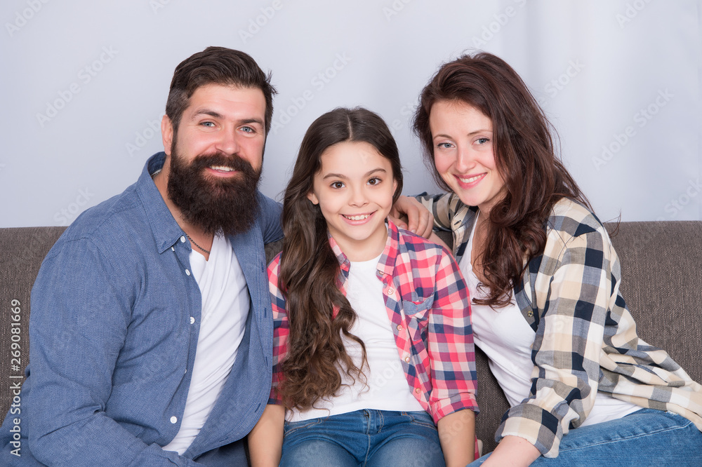 Always happy together. family weekend. mother and father love daughter. little girl with parents. trust and bonds. bearded man and woman with child. happy family relax at home. together forever