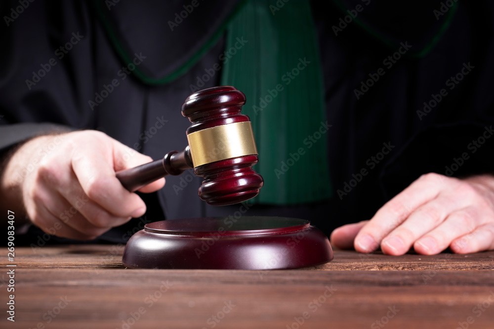 judge hits the gavel and pronunces final judgement judge hits the gavel and pronunces final judgement