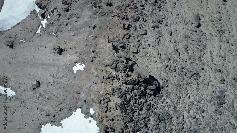 Aerial overhead view Andes mountains summits ground textures during winter. A rough texture environment with a rocky and snow landscape of a mountain peak. An amazing mountain wilderness scenery Aerial overhead view Andes mountains summits ground textures during winter. A rough texture environment with a rocky and snow landscape of a mountain peak. An amazing mountain wilderness scenery