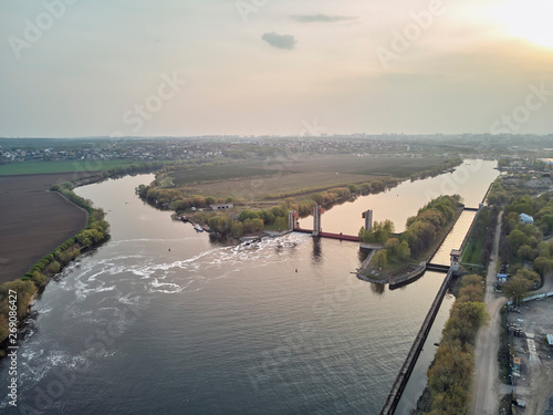 Sluice on the Moscow river near city Dzerzhinsky, aerial drone view on spring photo