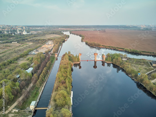 Sluice on the Moscow river near city Dzerzhinsky, aerial drone view on spring photo