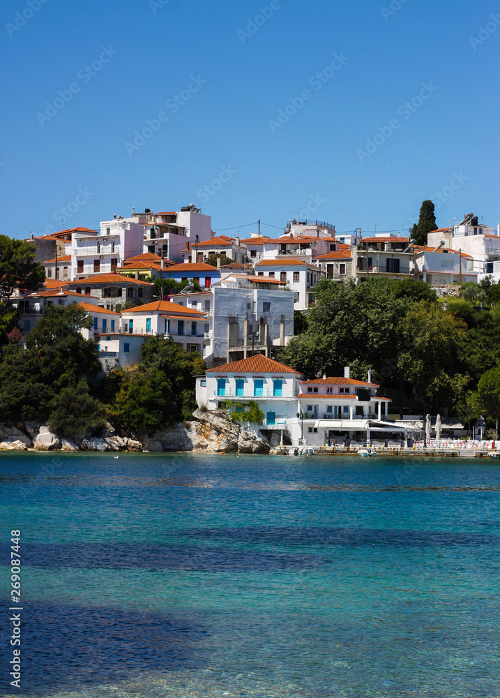 View of typical white houses of Skiathos town in Skiathos island, Aegean sea, Sporades, Greece