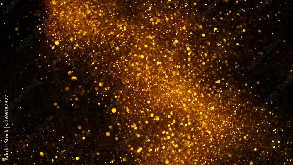 Golden Glitter Background in Super Slow Motion at 1000fps. Golden Glitter Background in Super Slow Motion at 1000fps.