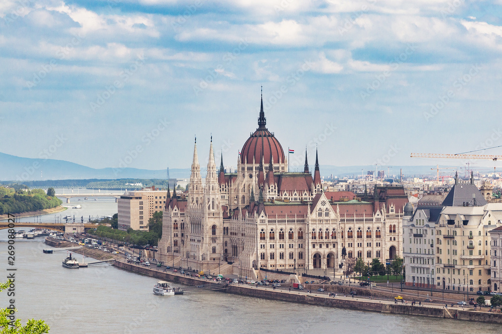 Budapest, Hungary. The building of the Hungarian Parliament. The symbol and business card of the city, located on the banks of the Danube. Spring. Tourism and travel.
