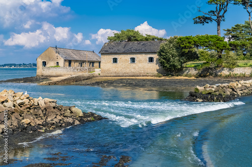 Berder island, in Brittany, in the Morbihan gulf, path covered by the sea at rising tide photo