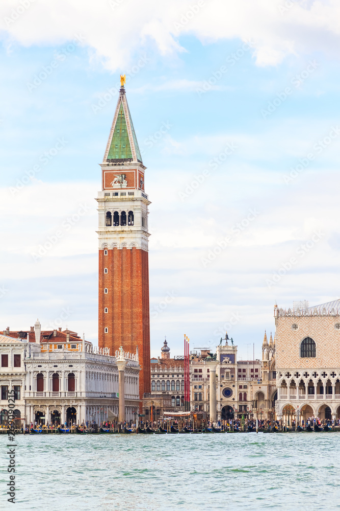 The bell tower of St Mark's Campanile and Piazza San Marco in Venice, Italia. View from Water on San Marco canal, seaside.