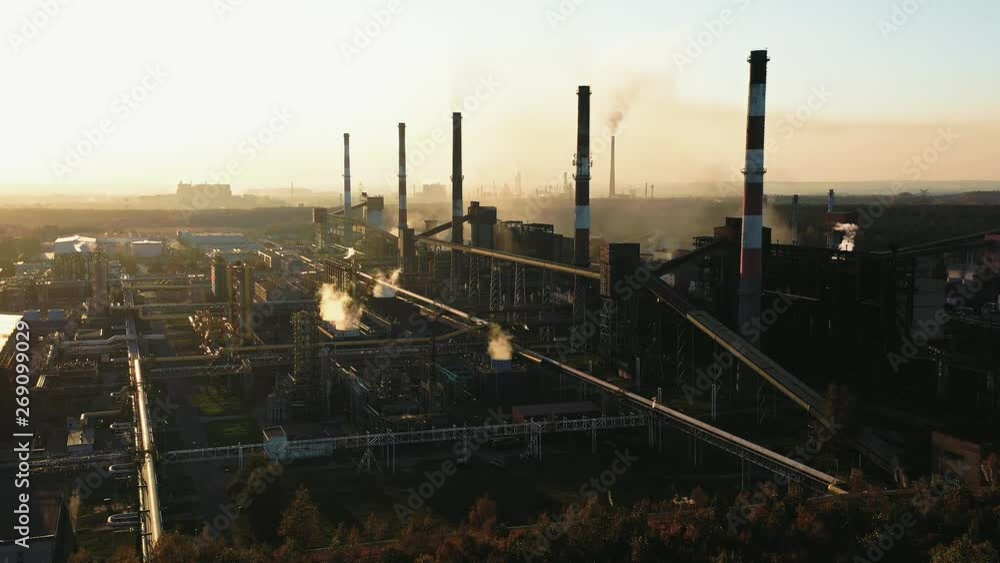 industrial landscape with heavy pollution produced by a large factory industrial landscape with heavy pollution produced by a large factory