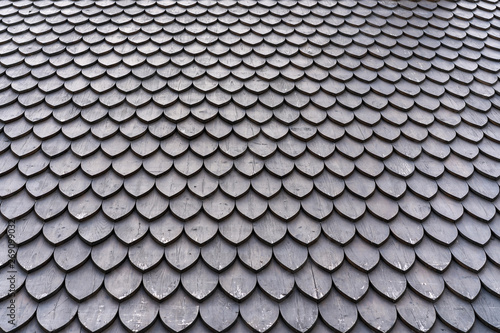 wooden tiles on the roof of a historic building