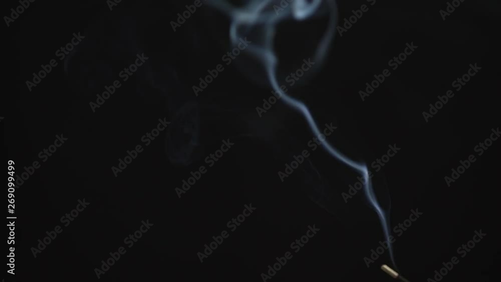 Close up of cigarette smoke drifting. Close up of cigarette smoke drifting.