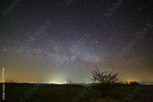 Stars of the Milky Way in the night sky. Landscape photographed with a long exposure.