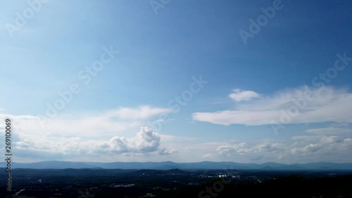 beautiful timelapse of Virginia vineyard with trees clouds and mountains