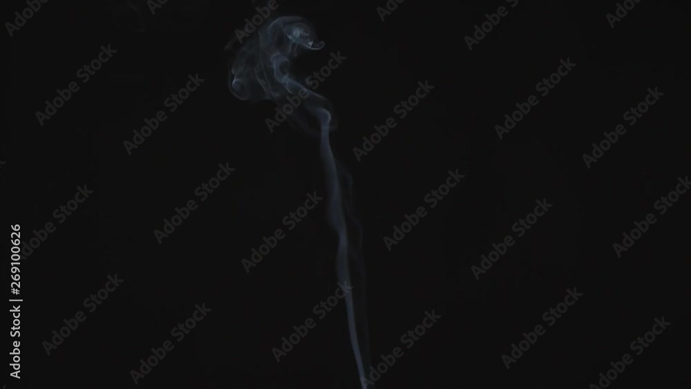 Close up of cigarette smoke drifting. Close up of cigarette smoke drifting.