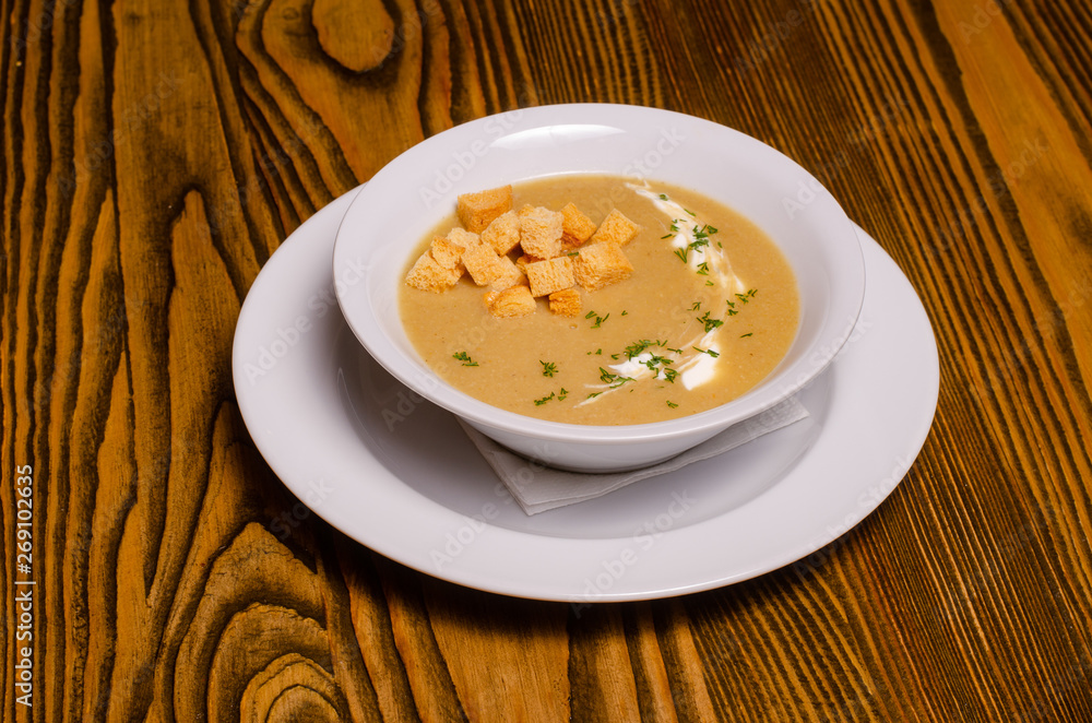 Minestrone, italian vegetable soup with pasta on wooden table. Top view Minestrone, italian vegetable soup with pasta on wooden table. Top view