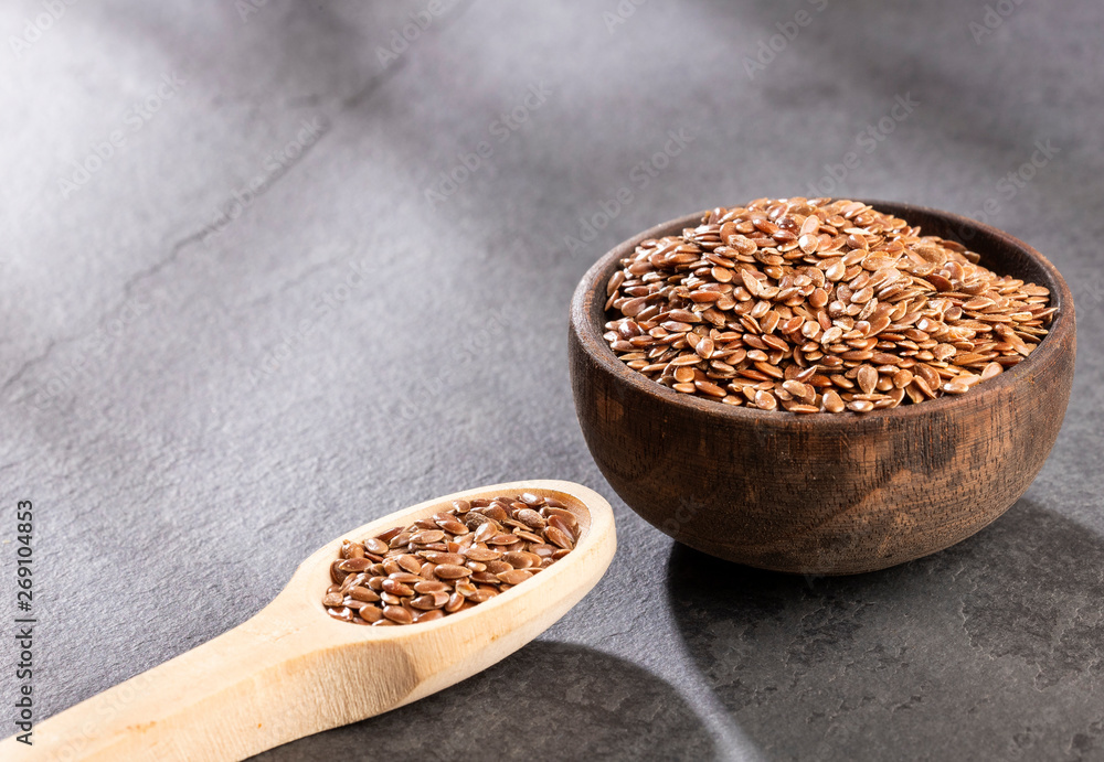 Linseed organic seeds - Linum usitatissimum. Text space Linseed organic seeds - Linum usitatissimum. Text space