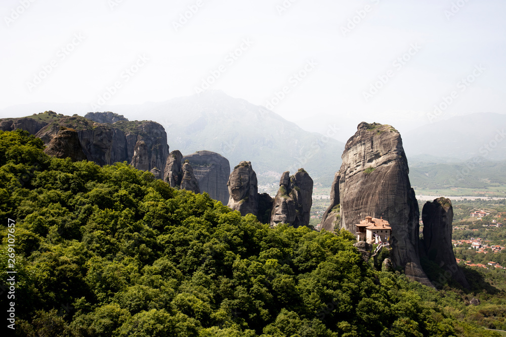 Meteora travel destination,  monastery in a rock landscape 