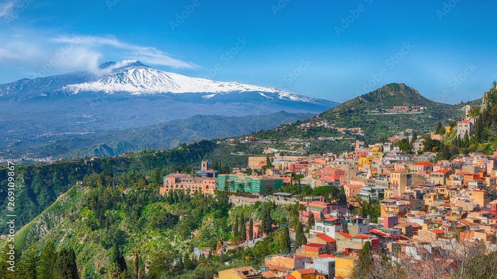 Etna volcano and Taormina town aerial panoramic view