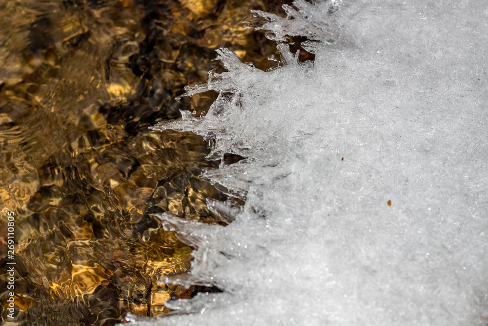 Growing ice on the winter creek Growing ice on the winter creek