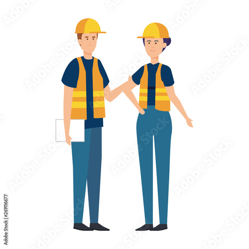couple builders workers with helmets