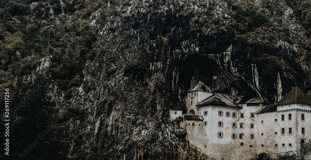 Renaissance castle by a cave