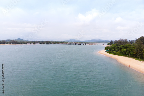 Scenic landscape of big river and reservoir dam with mountain and nature forest © Kaikoro