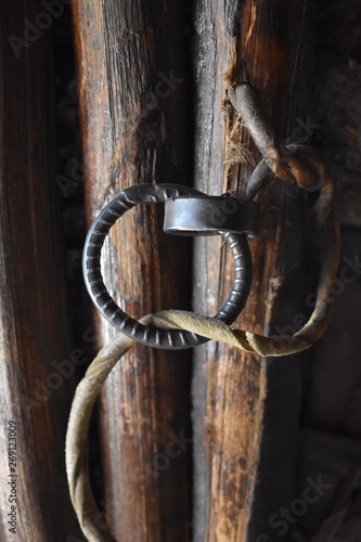 Metal door handle with a leather rope