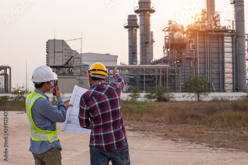 Engineers working in power plant work sites