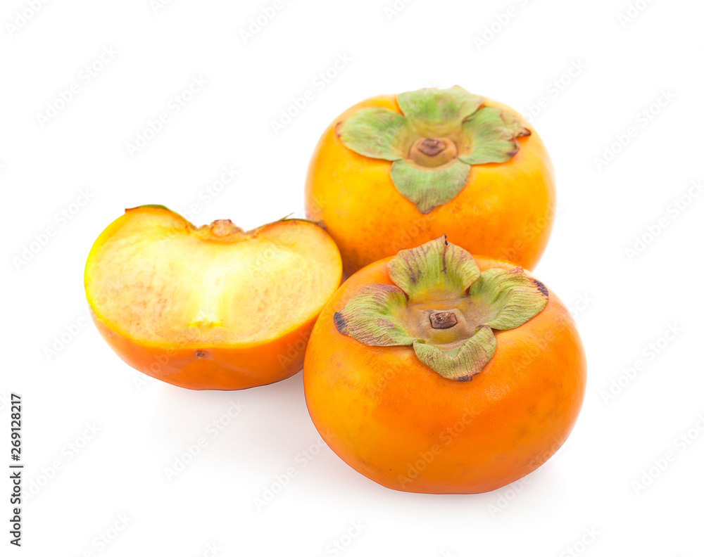 Tropical fruit persimmon. Kaki with leaves on white background Tropical fruit persimmon. Kaki with leaves on white background