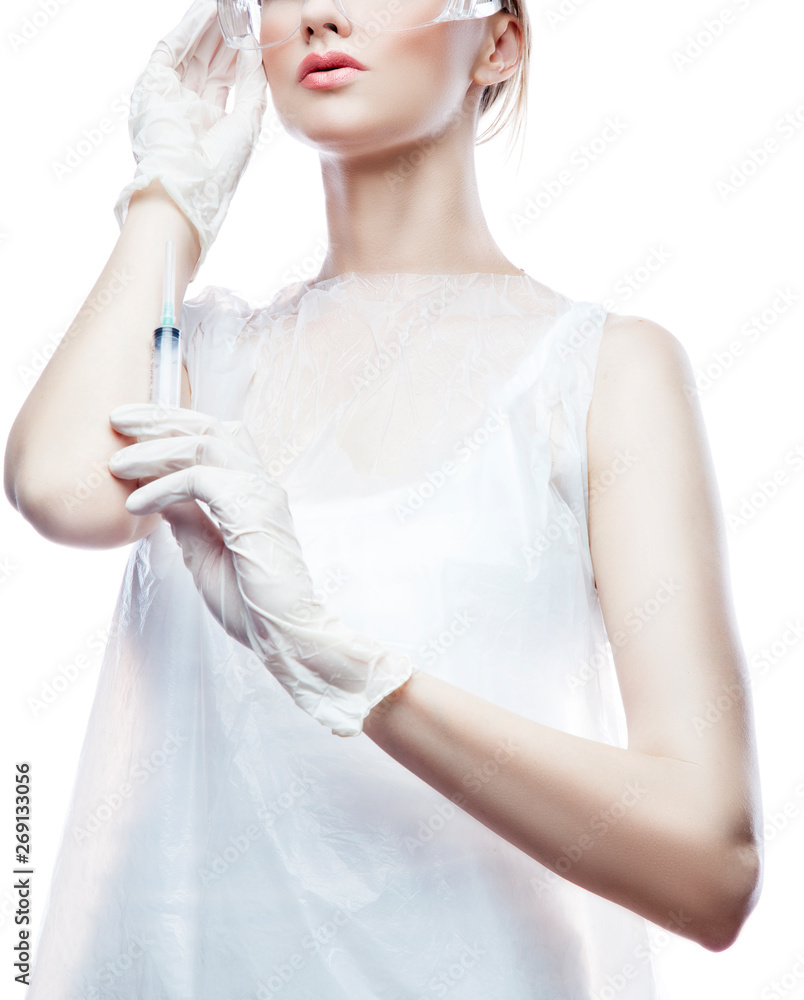 Part of doctor woman portrait hold syringe in hand. Isolated. White background Part of doctor woman portrait hold syringe in hand. Isolated. White background