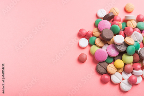 Pile of colored pills, capsule and tablets © dimasobko