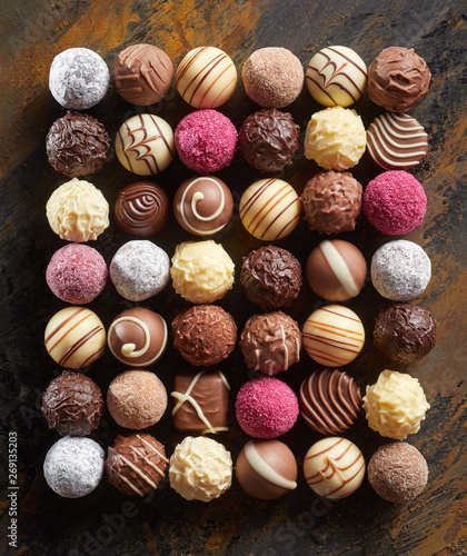 Neat flat lay of luxury chocolate pralines