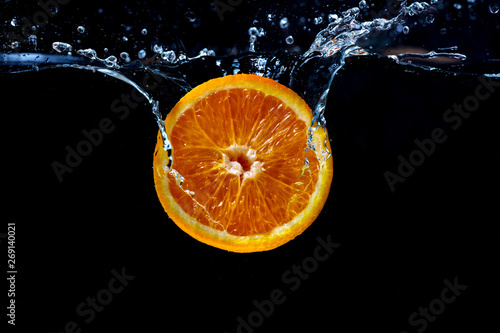 Orange with fresh water splash