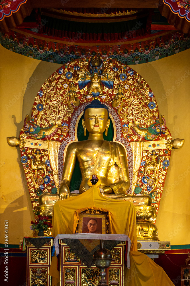 Buddha statue in temple in Tibetan art center in Norbulinka Institute Dharamsala
