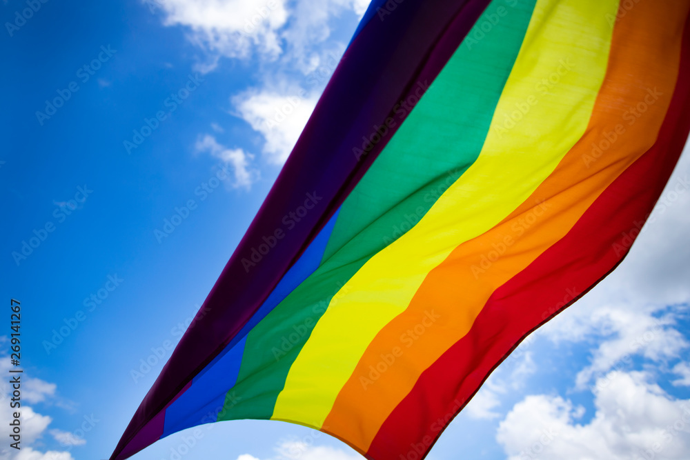 Colorful LGBT flag blows in the breez. Colorful LGBT flag blows in the breez.