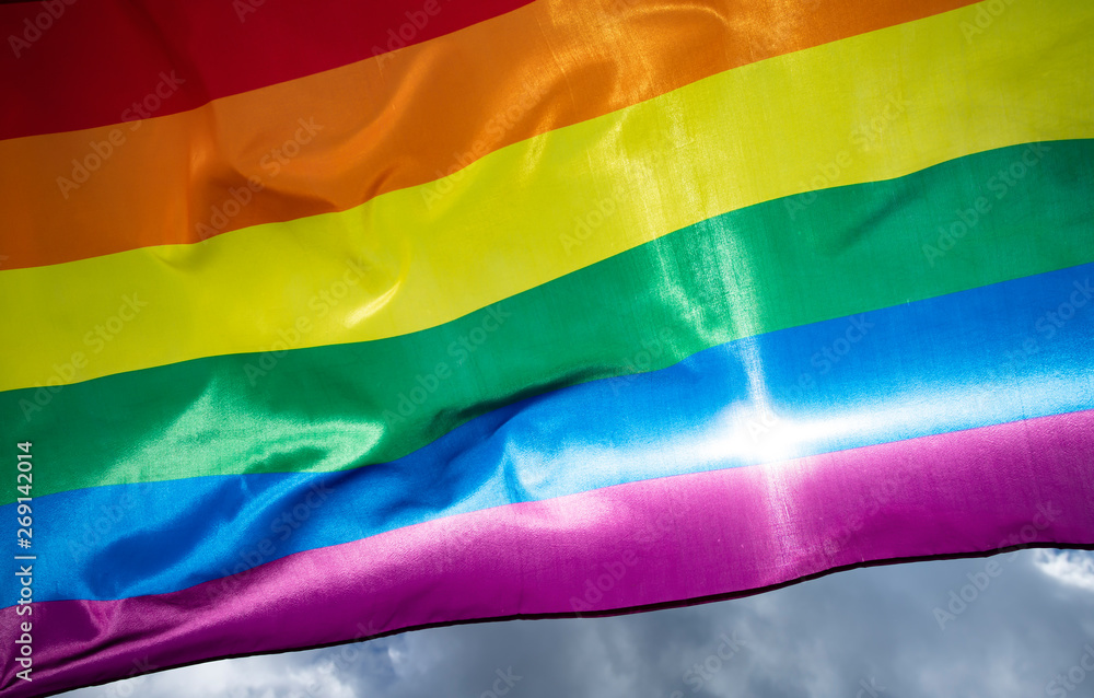 Colorful LGBT flag blows in the breez. Colorful LGBT flag blows in the breez.