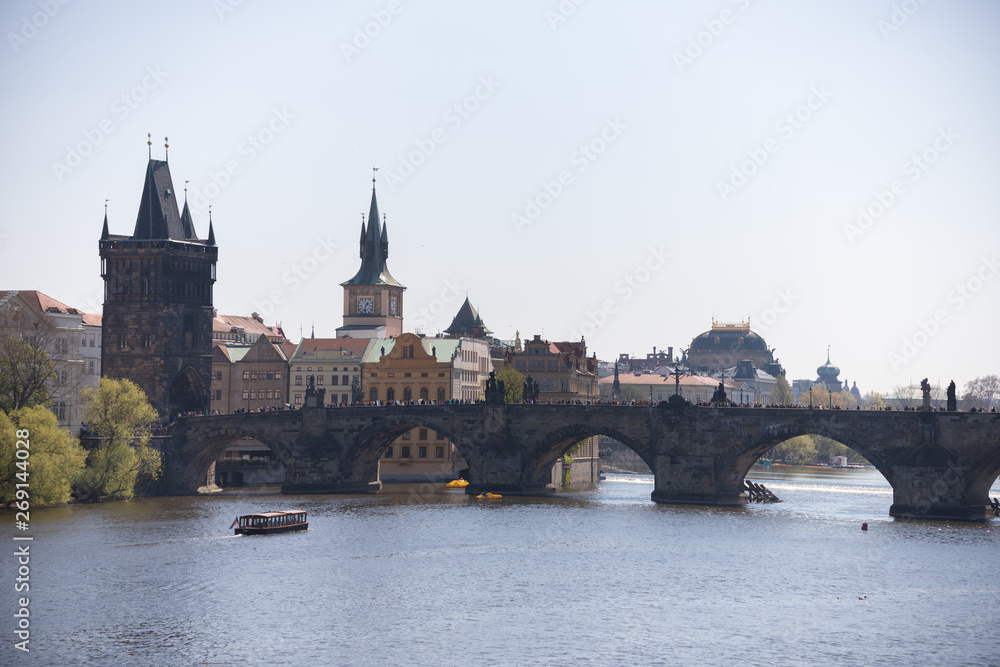 Charles Bridge in a calm weather and a daylight