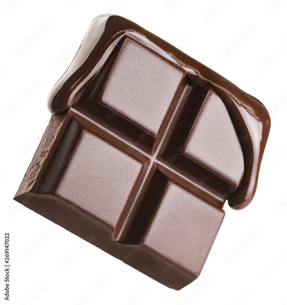 Melted chocolate pours into a piece of chocolate bar isolated on white