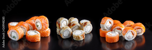 Classic sushi roll. Sushi at black background.Japanese seafood sushi , sushi a black background.