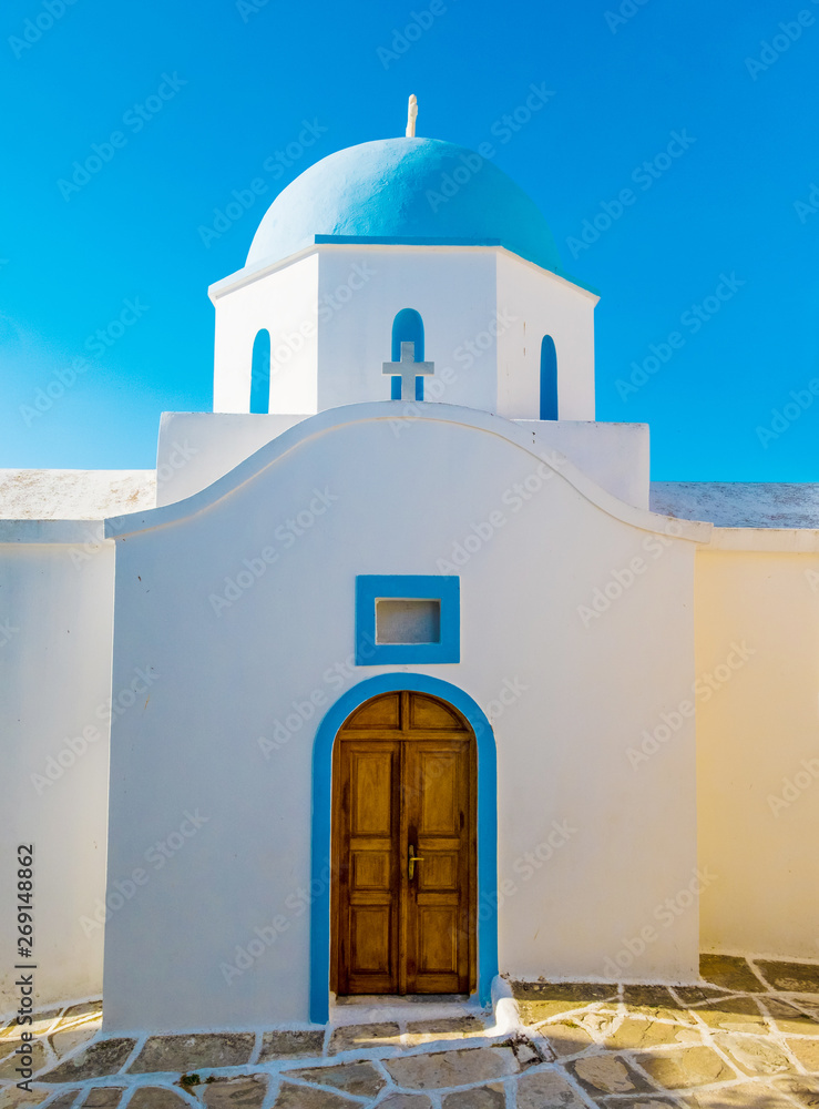 Blue dome orthodox church on blue sky background, Greece