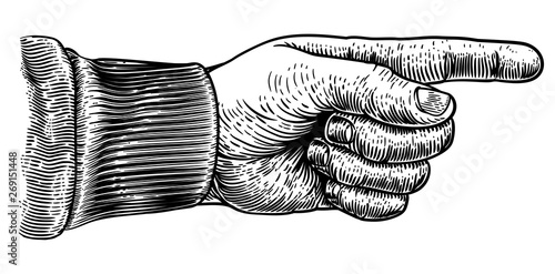 A hand pointing a finger in a direction sign. In a vintage antique engraving woodblock or woodcut style.