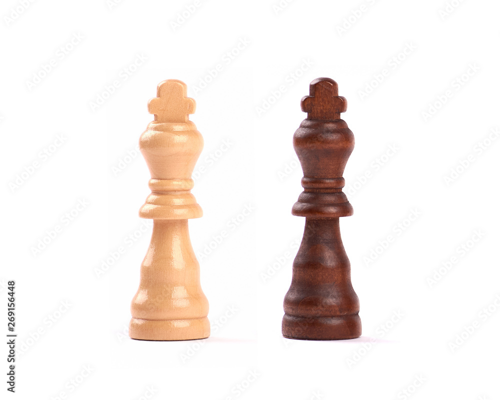 Detailed photo of two chess pieces, kings, black and white. Isolated on white background. Detailed photo of two chess pieces, kings, black and white. Isolated on white background.