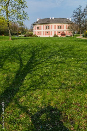Prague, Czech Republic / Europe - April 05 2017: Chodov fortress, originally a round medieval fortress from 13th century, spring sunny day, a park with trees and green grass, vertical image