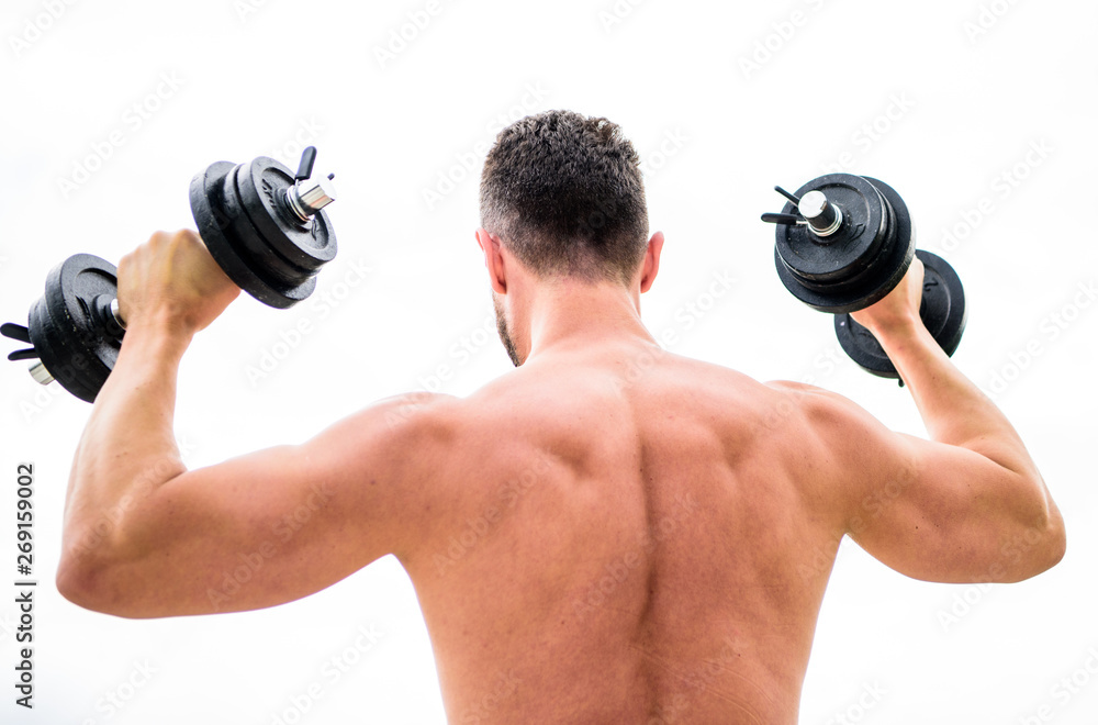 man sportsman weightlifting. steroids. athletic body. Dumbbell gym. fitness and sport equipment. Muscular back man exercising in morning with barbell. Healthy lifestyle. Never give up and keep moving