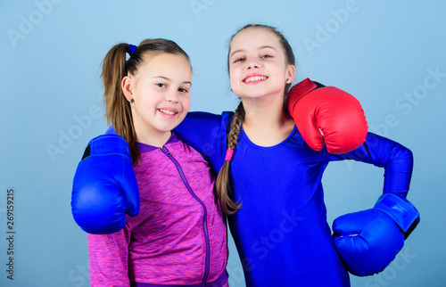 Morning workout. Happy children sportsman in boxing gloves. Fitness diet. energy health. workout of small girls boxer in sportswear. punching knockout. Childhood activity. Sport success. Friendship