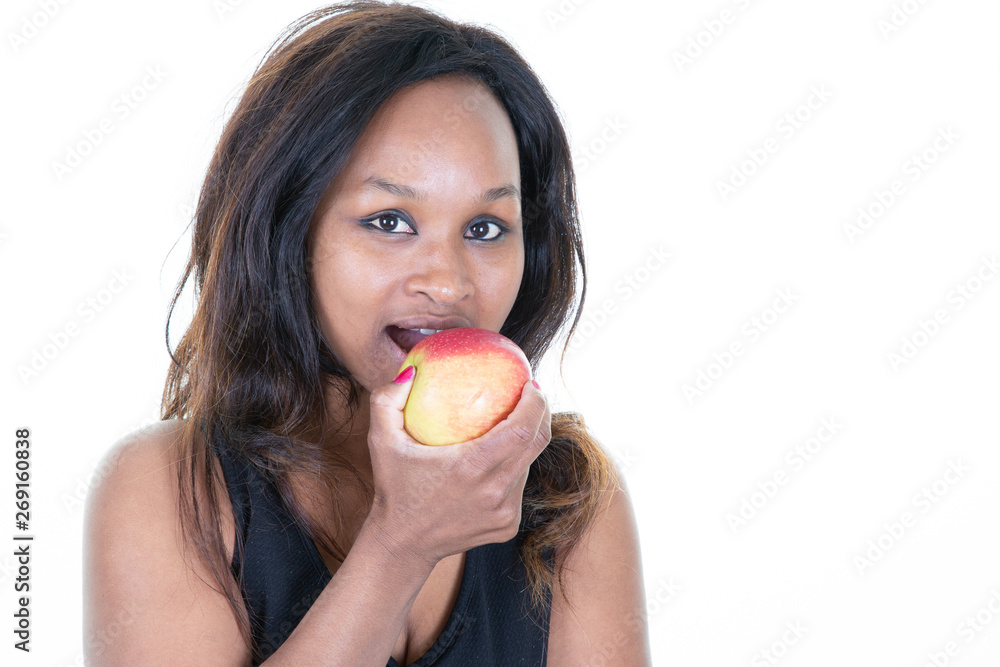 Happy young pregnant african woman holding red apple Happy young pregnant african woman holding red apple