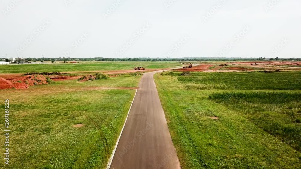 Drone of road leading to construction of s neighborhood. Drone of road leading to construction of s neighborhood.