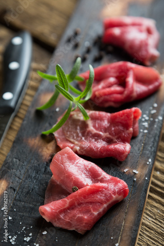 Photos Thinly sliced beef pieces. beef carpaccio