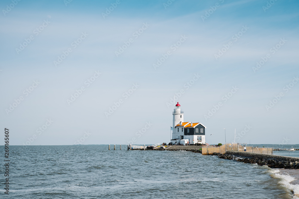 Panoramic view of lighthouse on coast of Marken, Netherlands